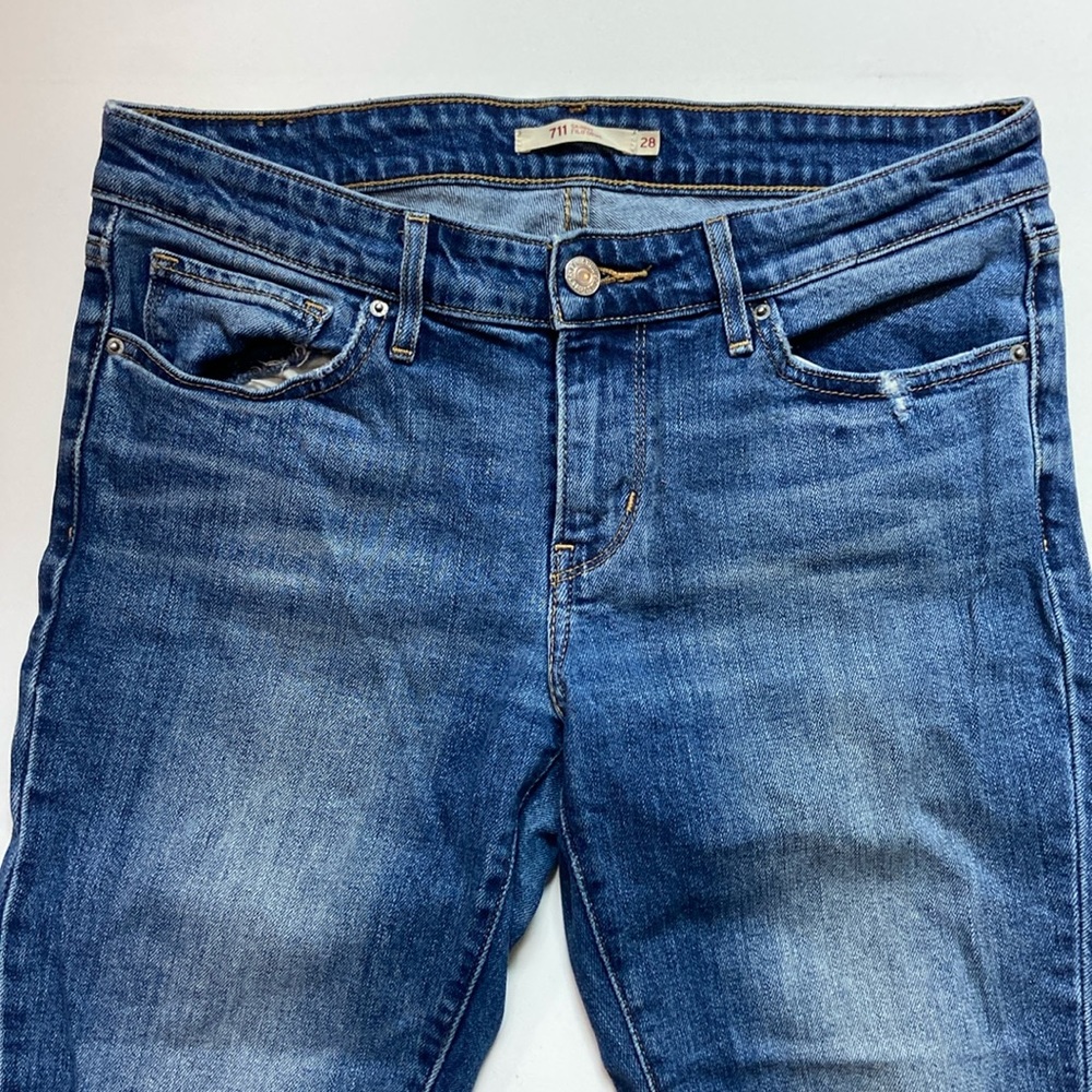 Levi’s 711 ripped skinny jeans